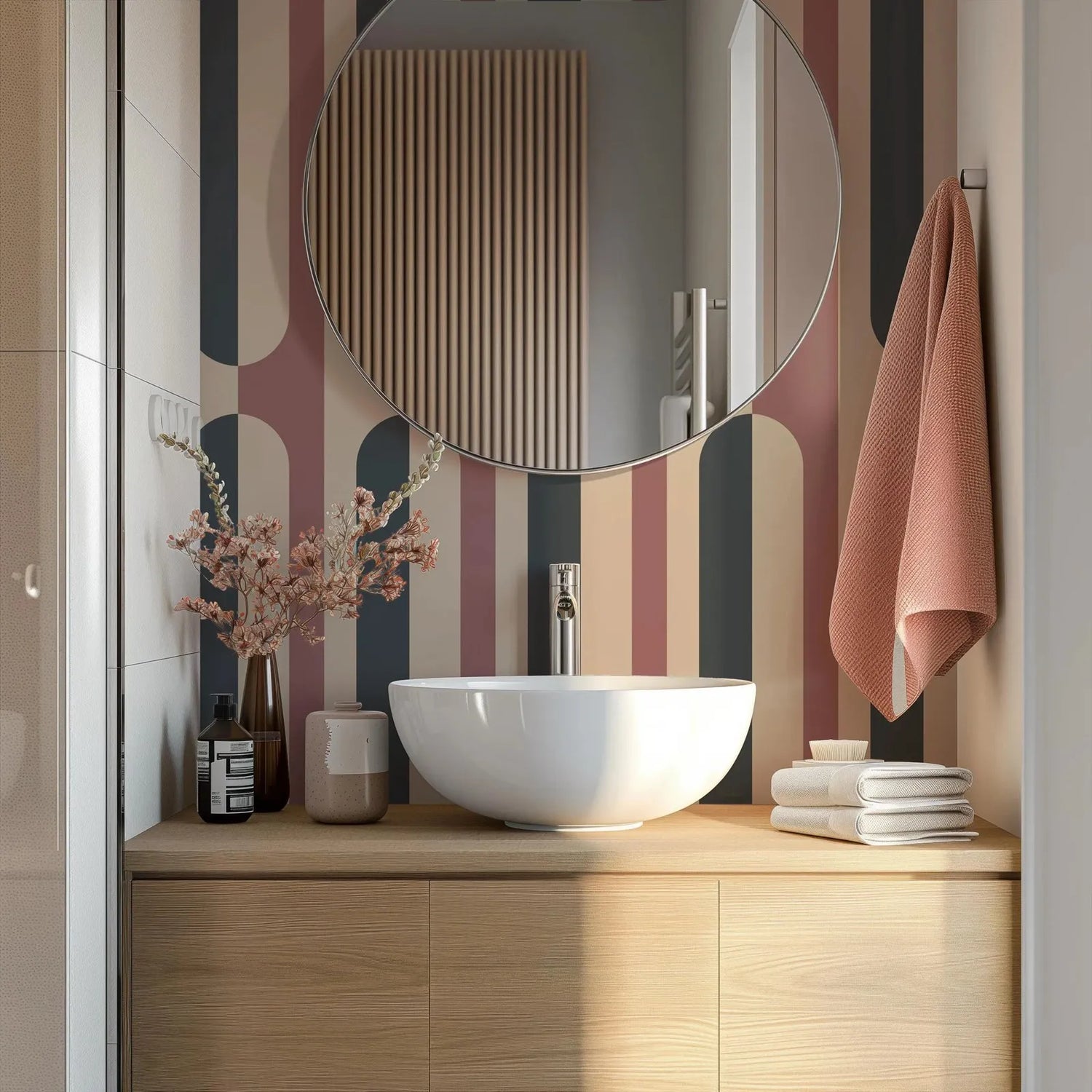 Bathroom with round mirror, sink, and striped wall.
