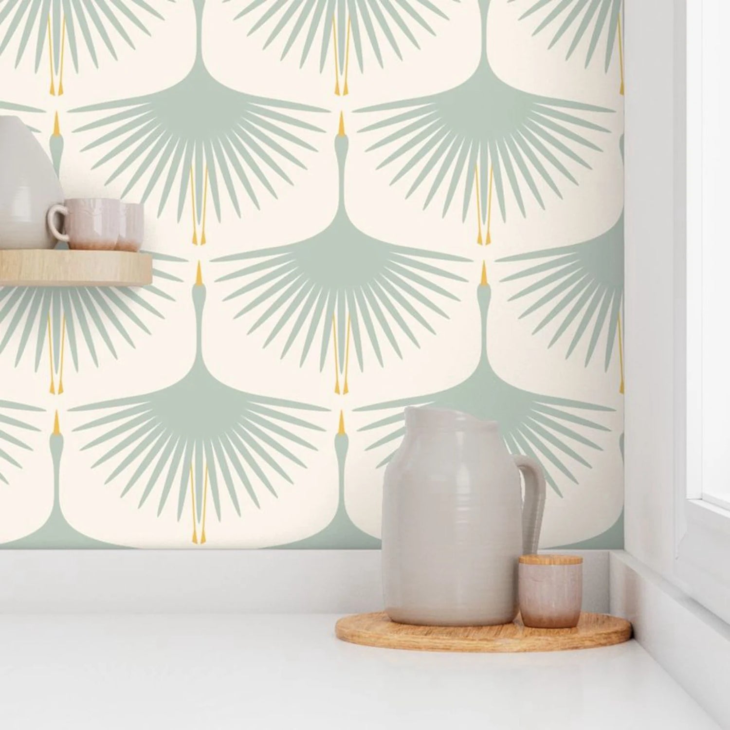 Room interior with a decorative wall pattern, ceramic pitcher, and small cup on a wooden tray.