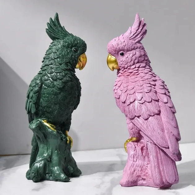 Add a vibrant touch to your decor with this decorative figurine showcasing an exotic parrot. With its colorful feathers and intricate detailing, this figurine brings a tropical charm to any space, whether displayed on a shelf, mantel, or tabletop.