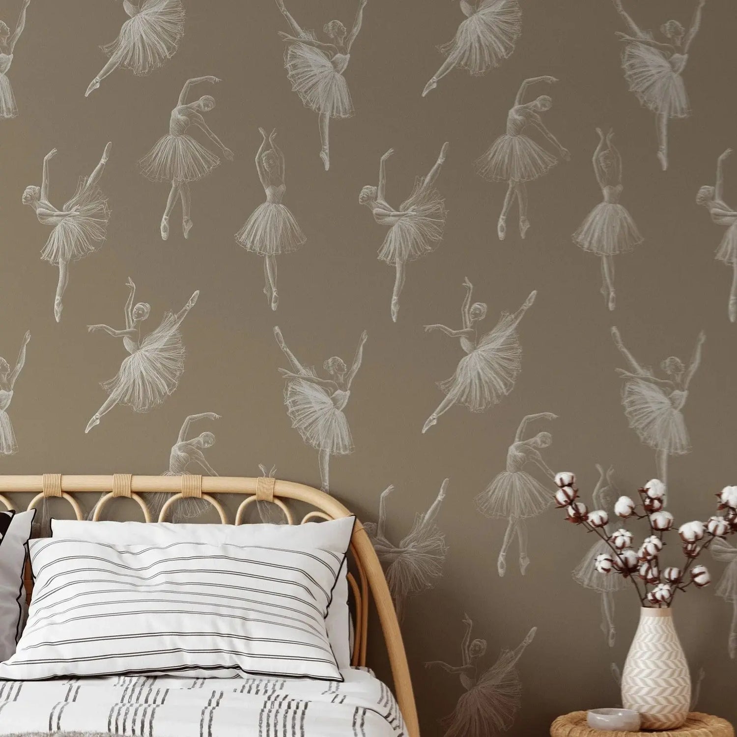 Bedroom with ballerina patterned wallpaper, wooden headboard, and decorative vase with cotton.