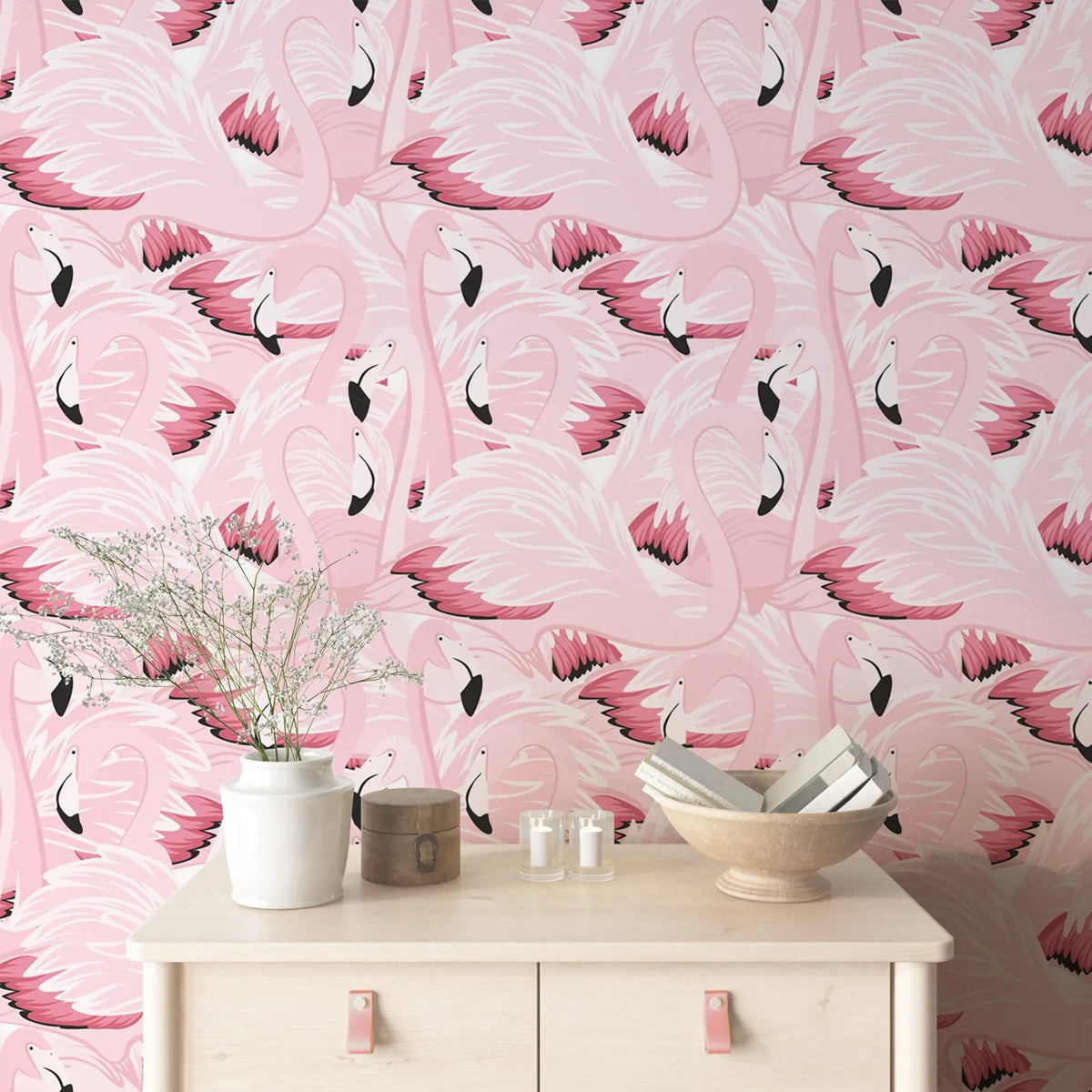 Flamingo patterned wallpaper with a table and decorative items in front