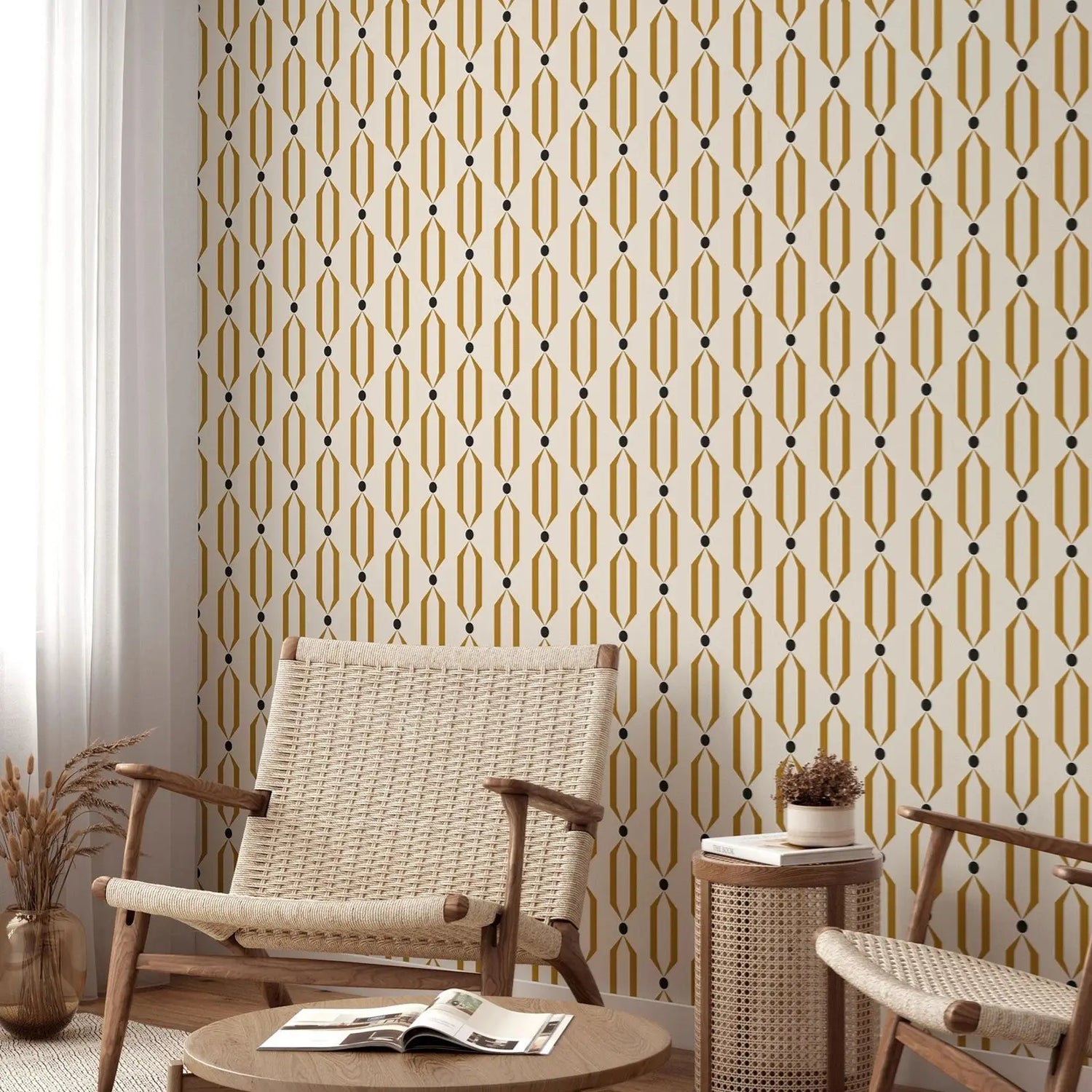 Living room with geometric patterned wallpaper, wicker chairs, and a small table.