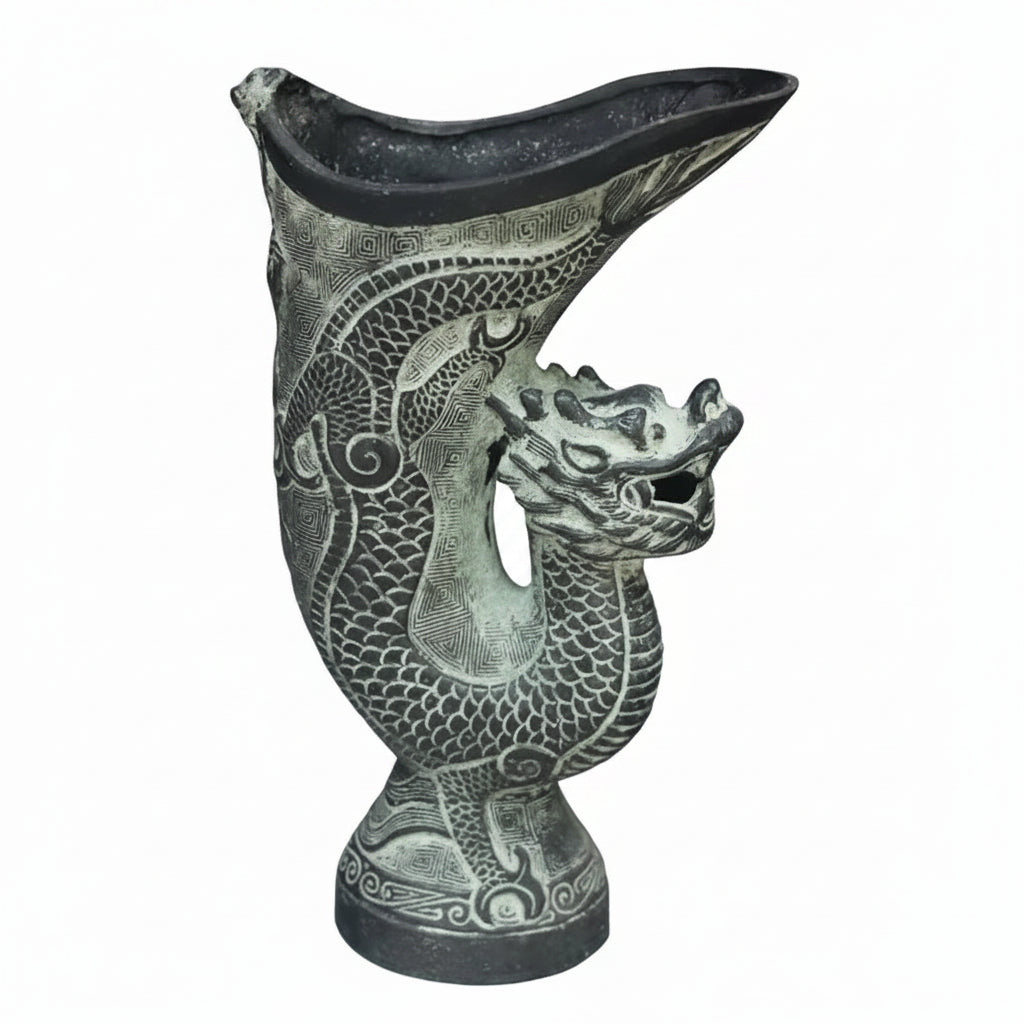 Decorative vase with dragon design on a gray background