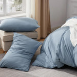 he 100% Washed Cotton Duvet Cover Set in Mineral Blue offers a serene and modern aesthetic for your bedroom. Crafted from 100% washed cotton, this duvet cover set is soft, breathable, and pre-washed for added comfort. The mineral blue hue adds a tranquil touch to your space