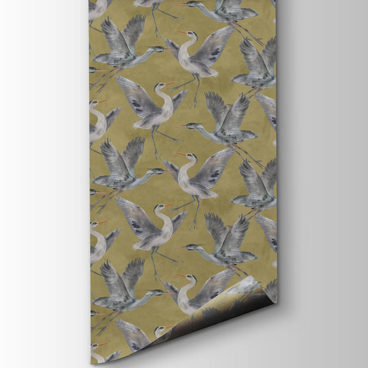 Patterned paper with bird design on a gold background