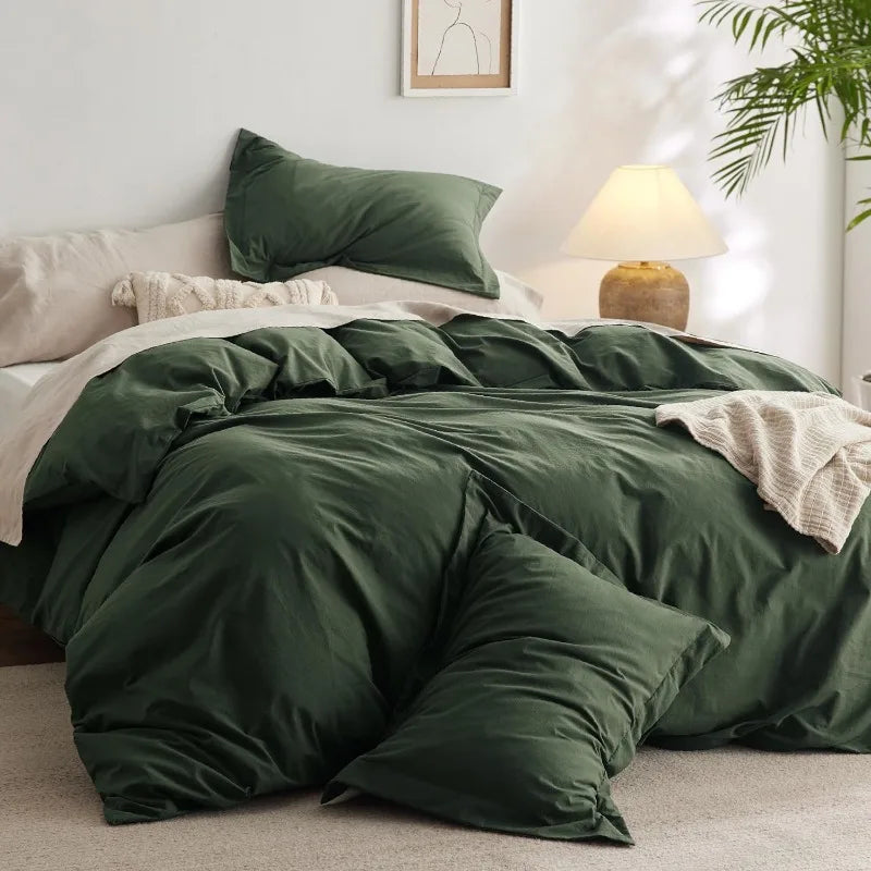 Washed Cotton Duvet Cover Set in Stone offers a blend of comfort and style, featuring a soft, relaxed texture achieved through stone-washing techniques. This process enhances the fabric's softness and imparts a lived-in look, making it a cozy addition to any bedroom.