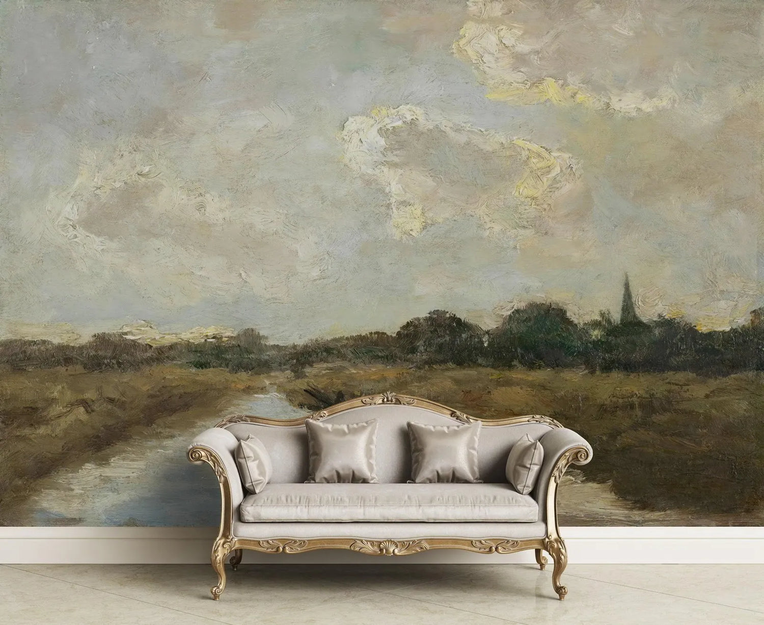 Decorative sofa in front of a large landscape painting with clouds and trees.