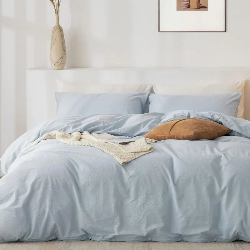 Refresh your bedroom with the 100% Washed Cotton 3-Piece Duvet Set in Baby Blue. Soft, breathable, and serene, it brings comfort and timeless elegance.