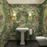 Bathroom with jungle-themed wallpaper, sink, and toilet.