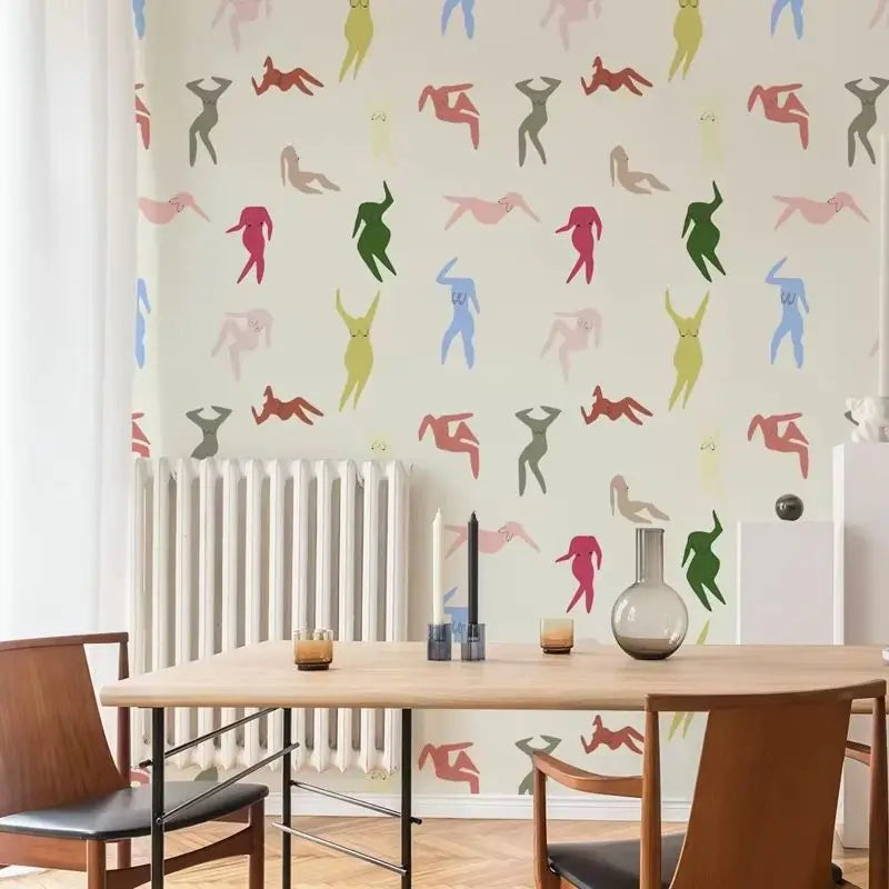 Dining room with colorful abstract figures on the wall