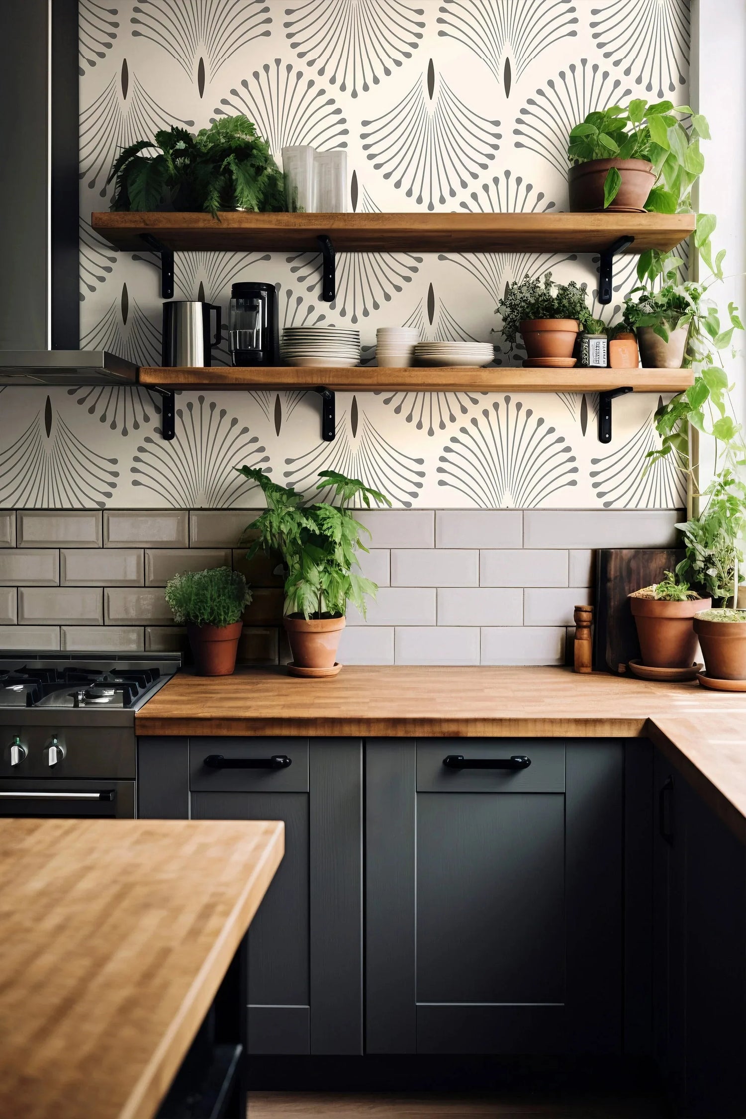 Modern kitchen with black cabinets, wooden countertops, and decorative wall tiles.