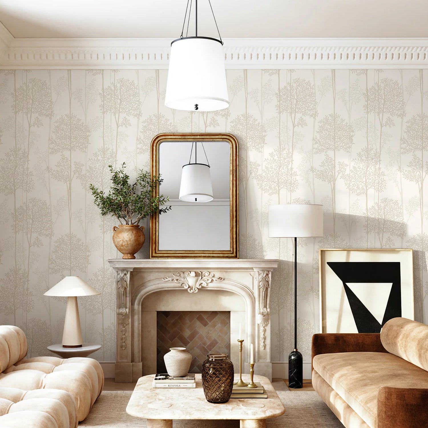Living room with beige sofas, a fireplace, and decorative elements.