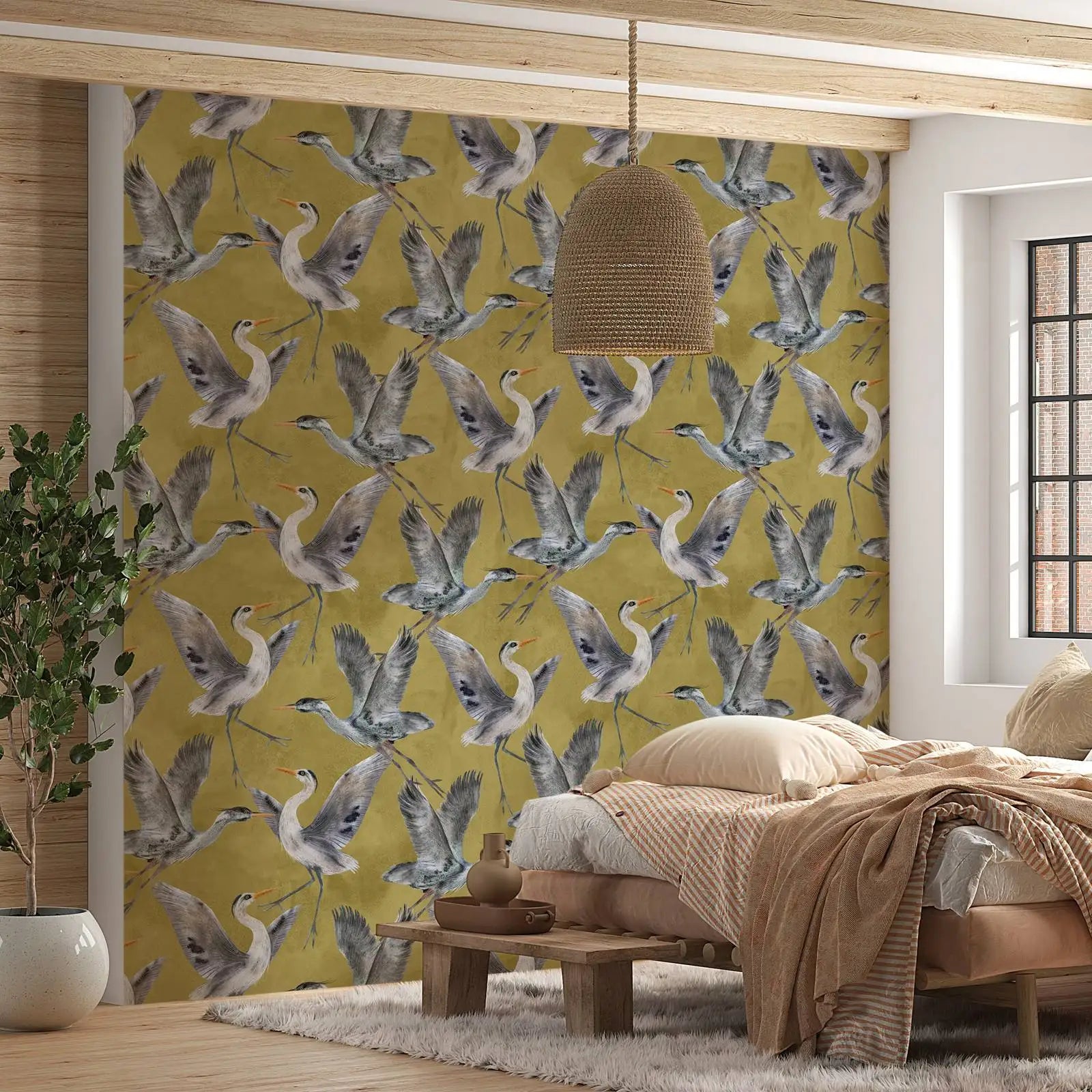 Room interior with a wall featuring a bird pattern on a yellow background.