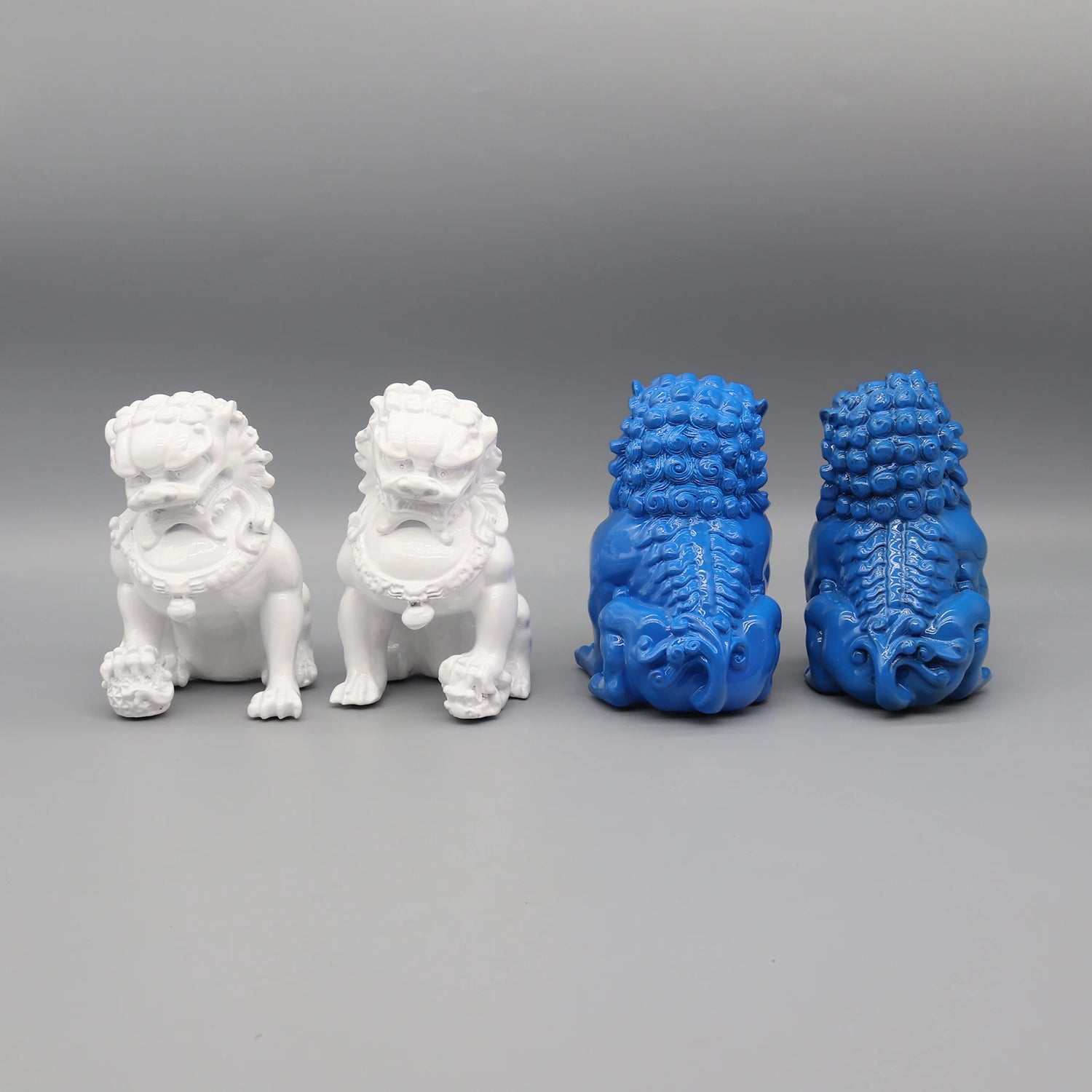 Pair of Resin Lion Statuettes