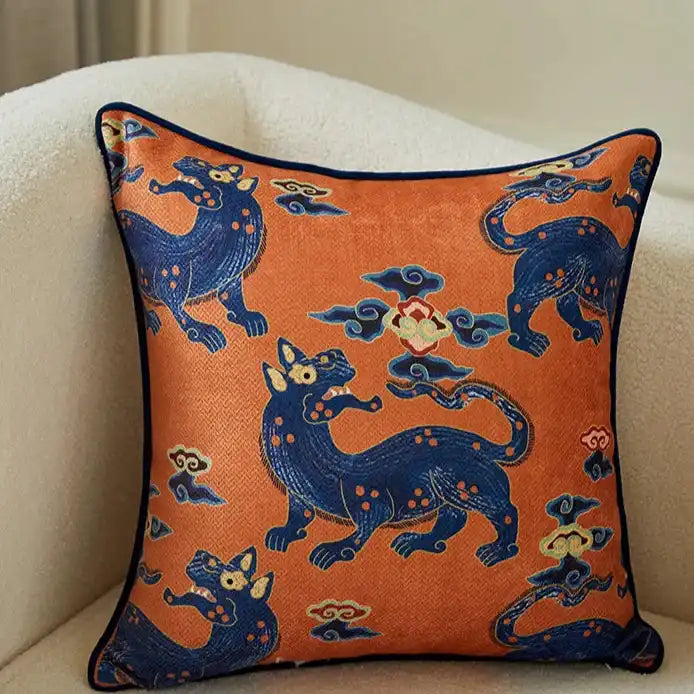 Vintage throw pillow featuring a dragon brocade design in vibrant orange and blue hues, perfect for adding a touch of elegance to any decor.