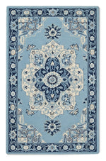 Sapphire Bloom Medallion Hand Tufted Rug — blue, navy, light blue traditional rug by Maia Homes on a white background