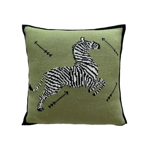Add a touch of adventure and style to your home decor with this eye-catching throw pillow cover. Featuring a bold design of arrows and zebra motifs in vibrant green hues, this cover is sure to make a statement in any room. The high-quality fabric ensures durability and comfort, while the playful pattern adds personality to your sofa or bed. Elevate your space with this unique and trendy pillow cover that brings a sense of fun and excitement to your living 