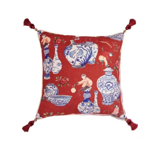 Add a touch of elegance to your decor with this red Chinoiserie-inspired pillow cover. Featuring intricate patterns and adorned with stylish tassels, this cover brings a timeless charm to any sofa or bed, instantly elevating the ambiance of your living space