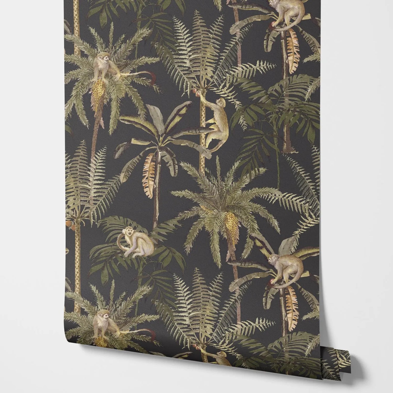 Roll of wallpaper with jungle design featuring monkeys and plants on a dark background