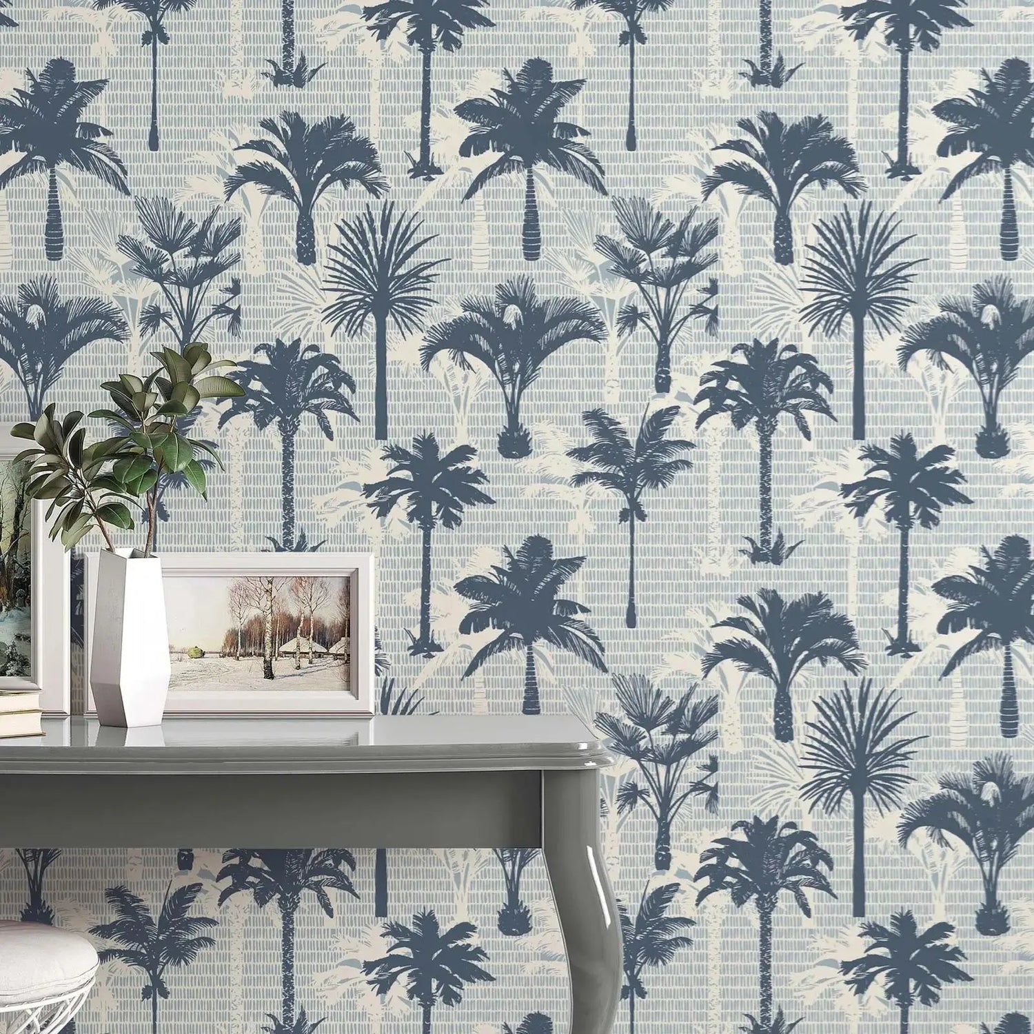 Wallpaper with palm tree pattern on a wall with a desk and decor.