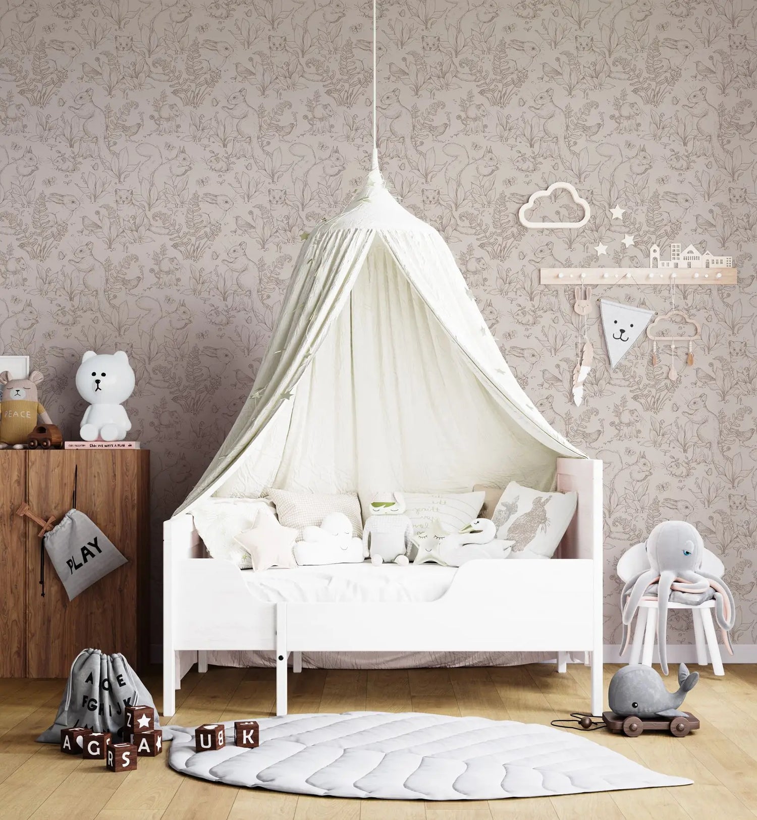 Children's bedroom with a white canopy bed, toys, and decorative elements.