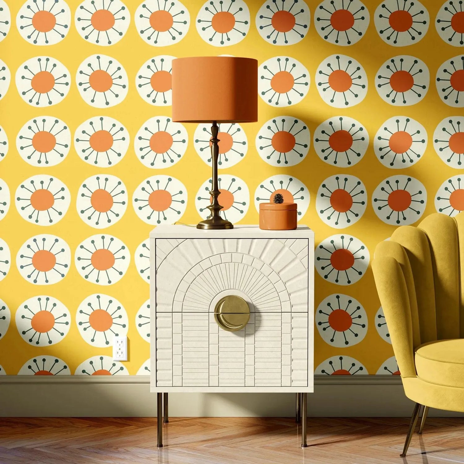 Decorative room interior with a yellow wall featuring a pattern, a white cabinet, and a yellow chair.