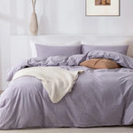 Elevate your bedroom with the 100% Washed Cotton 3-Piece Duvet Set in Light Purple. Soft, breathable, and elegant, it ensures comfort and style.