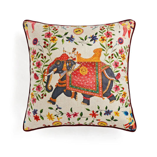 An image showcasing a throw pillow cover adorned with a captivating Indian elephants design. The elephants are intricately illustrated, displaying rich cultural motifs and vibrant colors. The pillow cover offers a blend of elegance and cultural charm, perfect for adding a unique touch to any home décor
