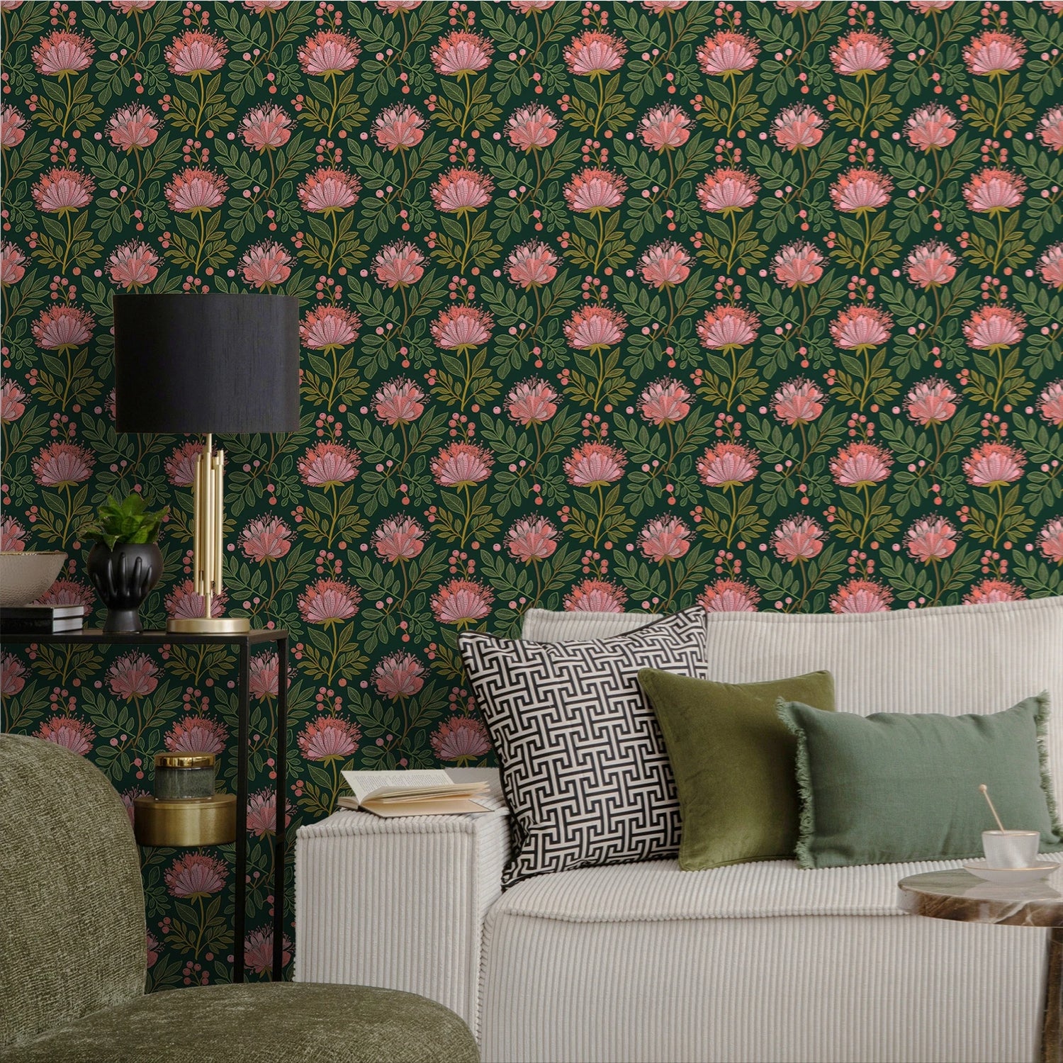 Living room with floral wallpaper, sofa, and decorative pillows.