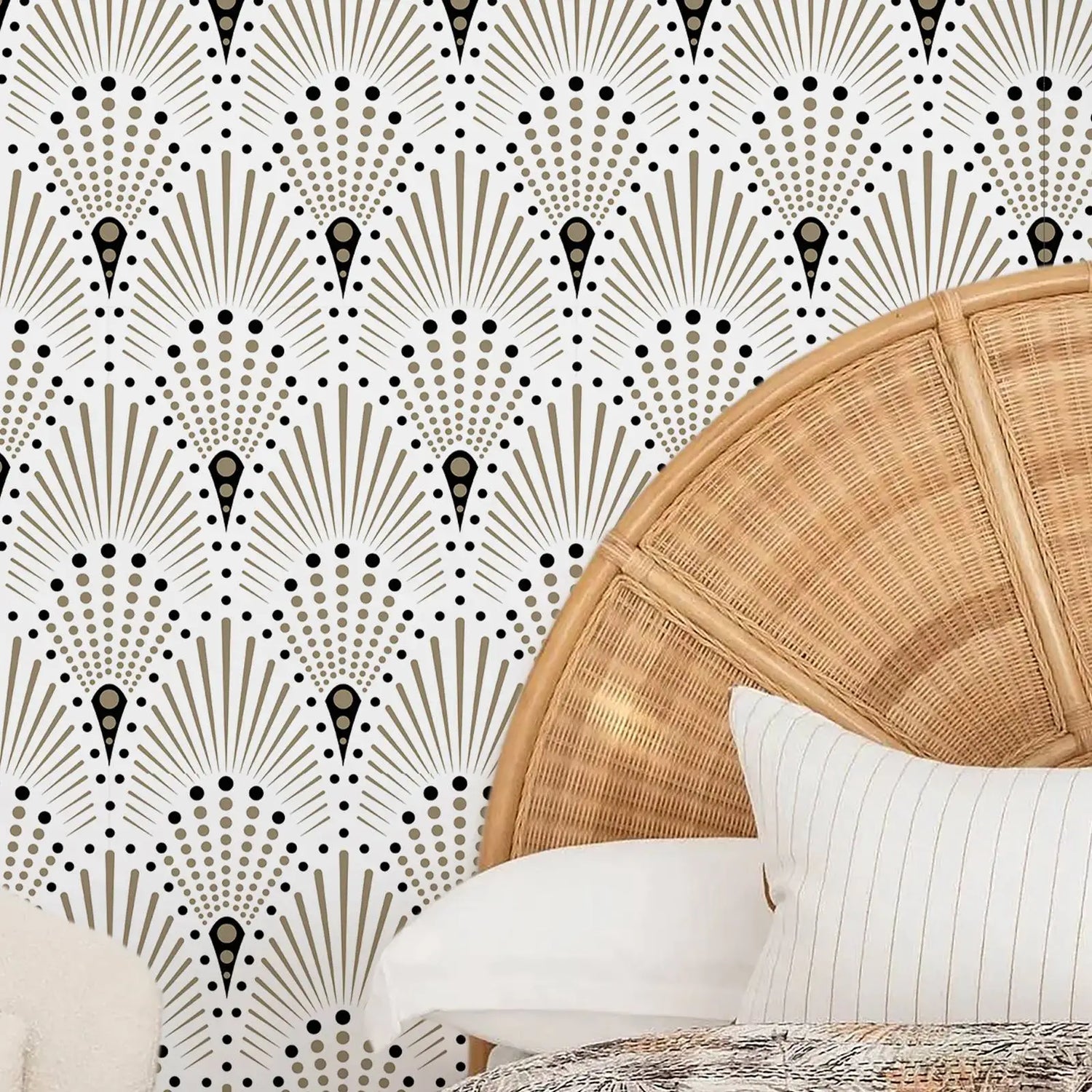 Wicker chair against a decorative wall with geometric pattern