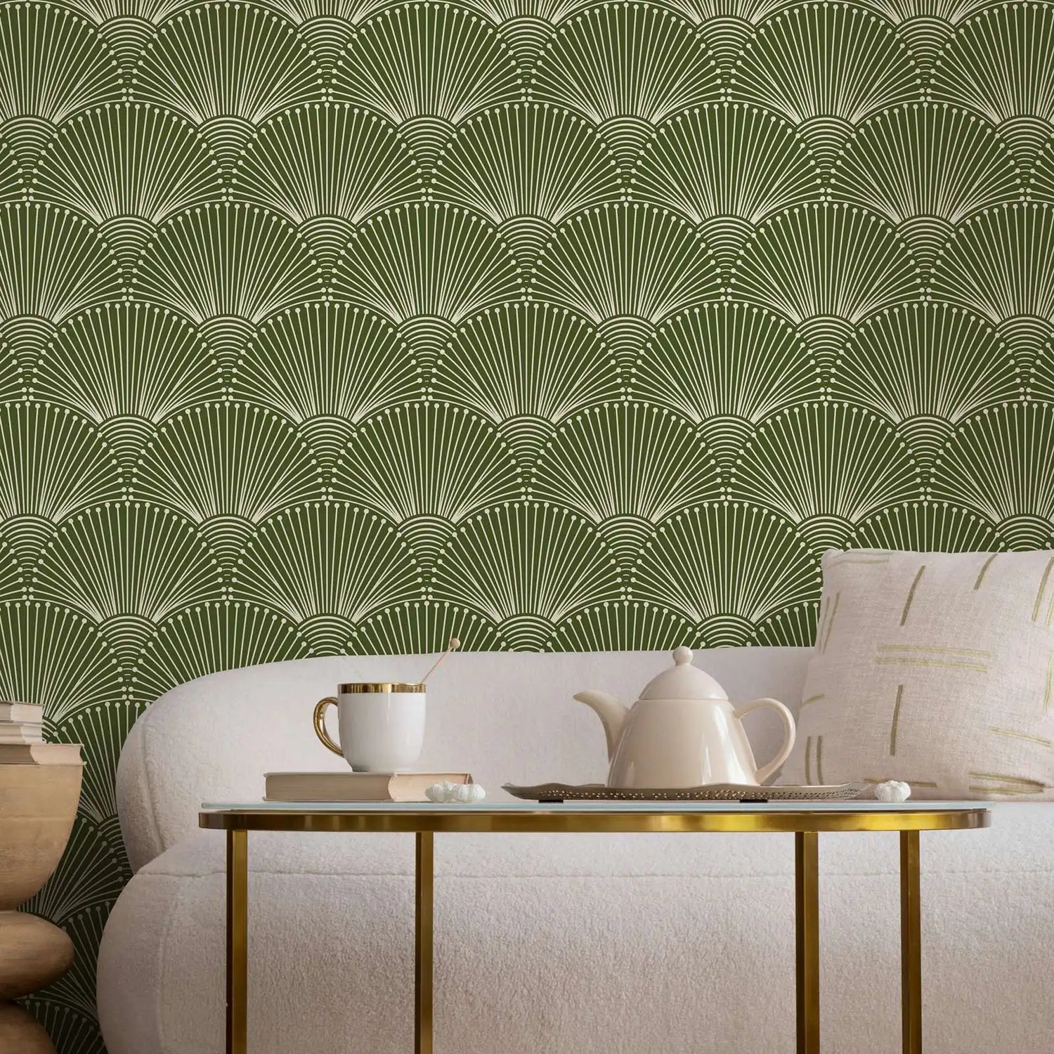 Living room with green fan-patterned wallpaper, white sofa, and decorative items on a table.