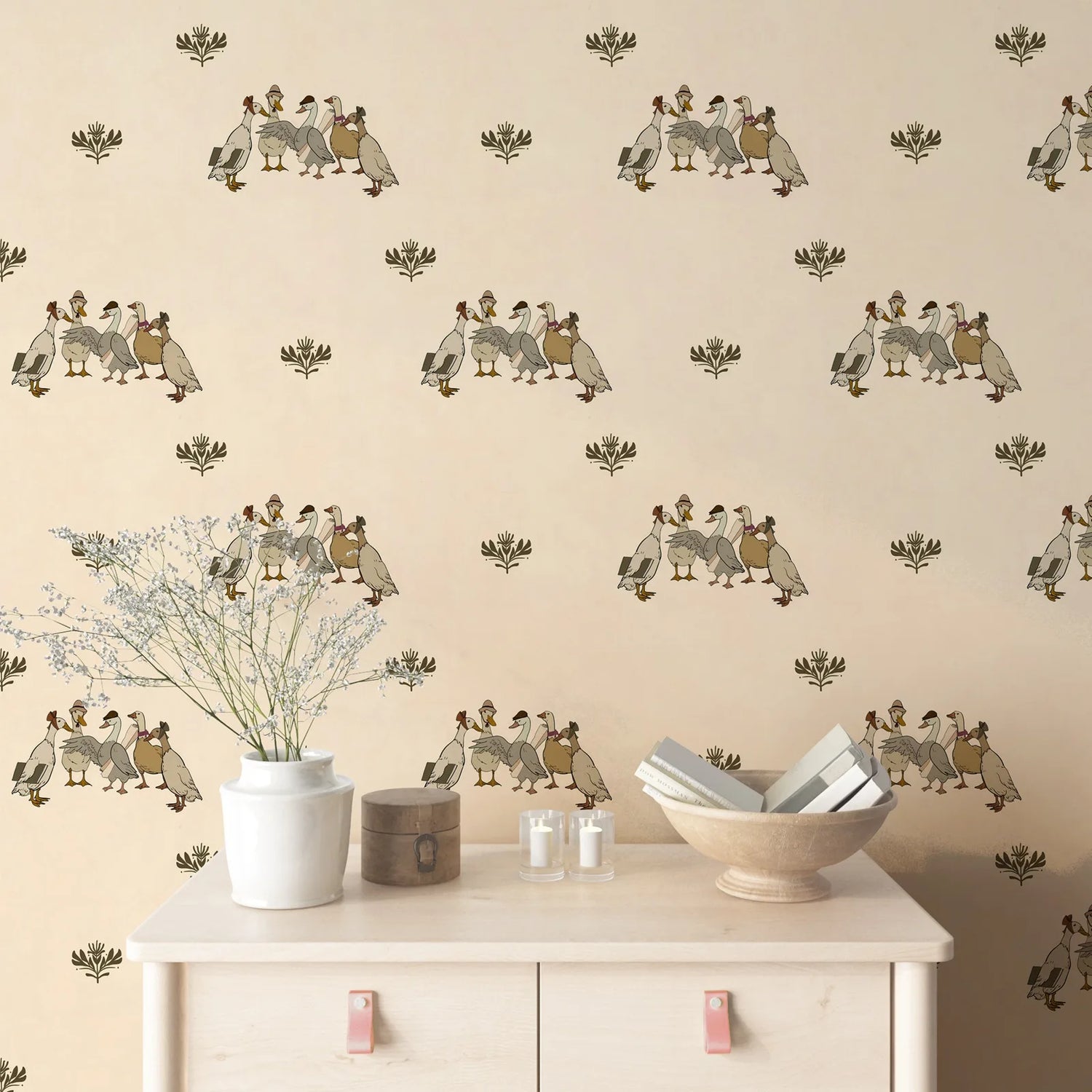Wallpaper with duck pattern, table with decor items against a matching background