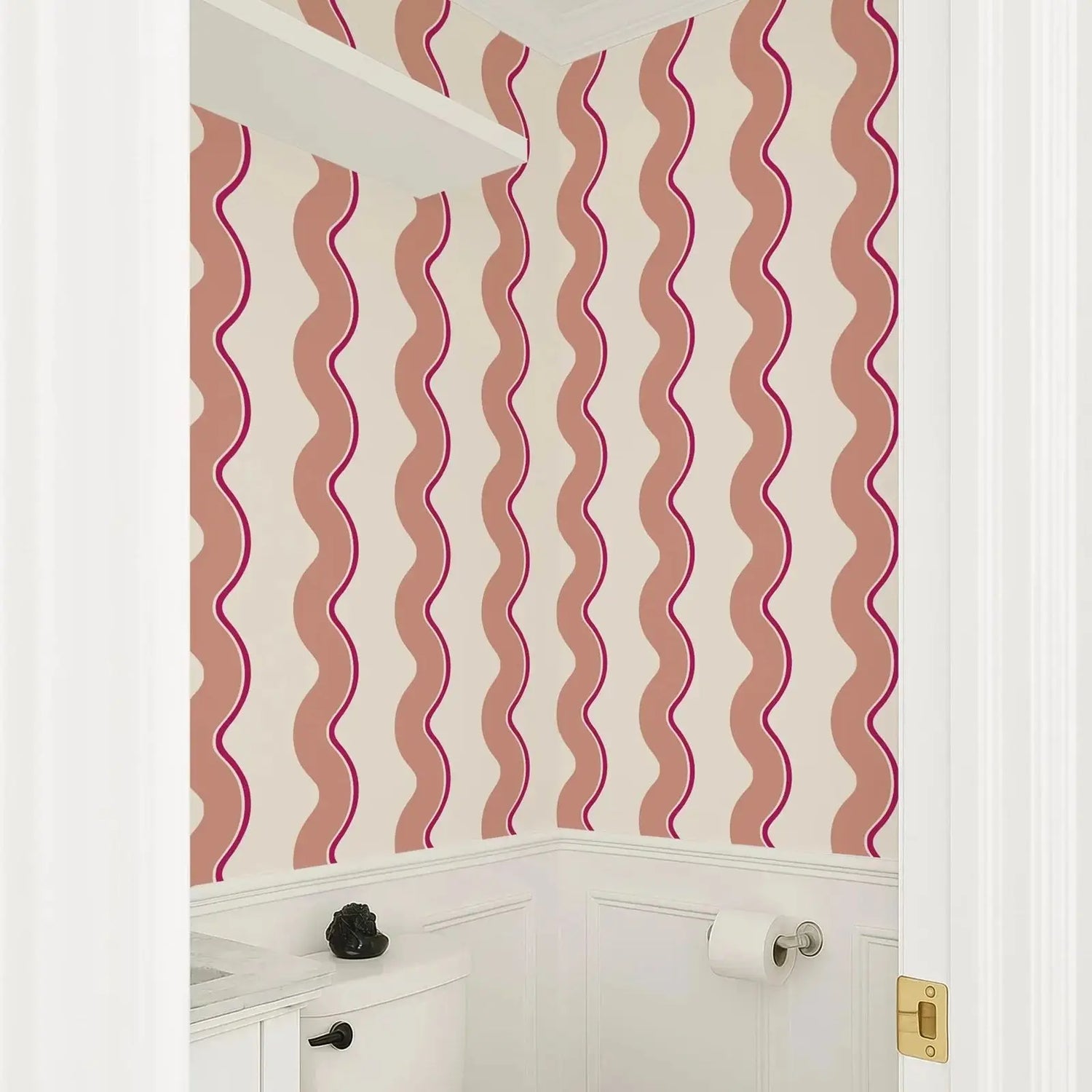 Wall with pink wavy pattern on white wall and cabinets