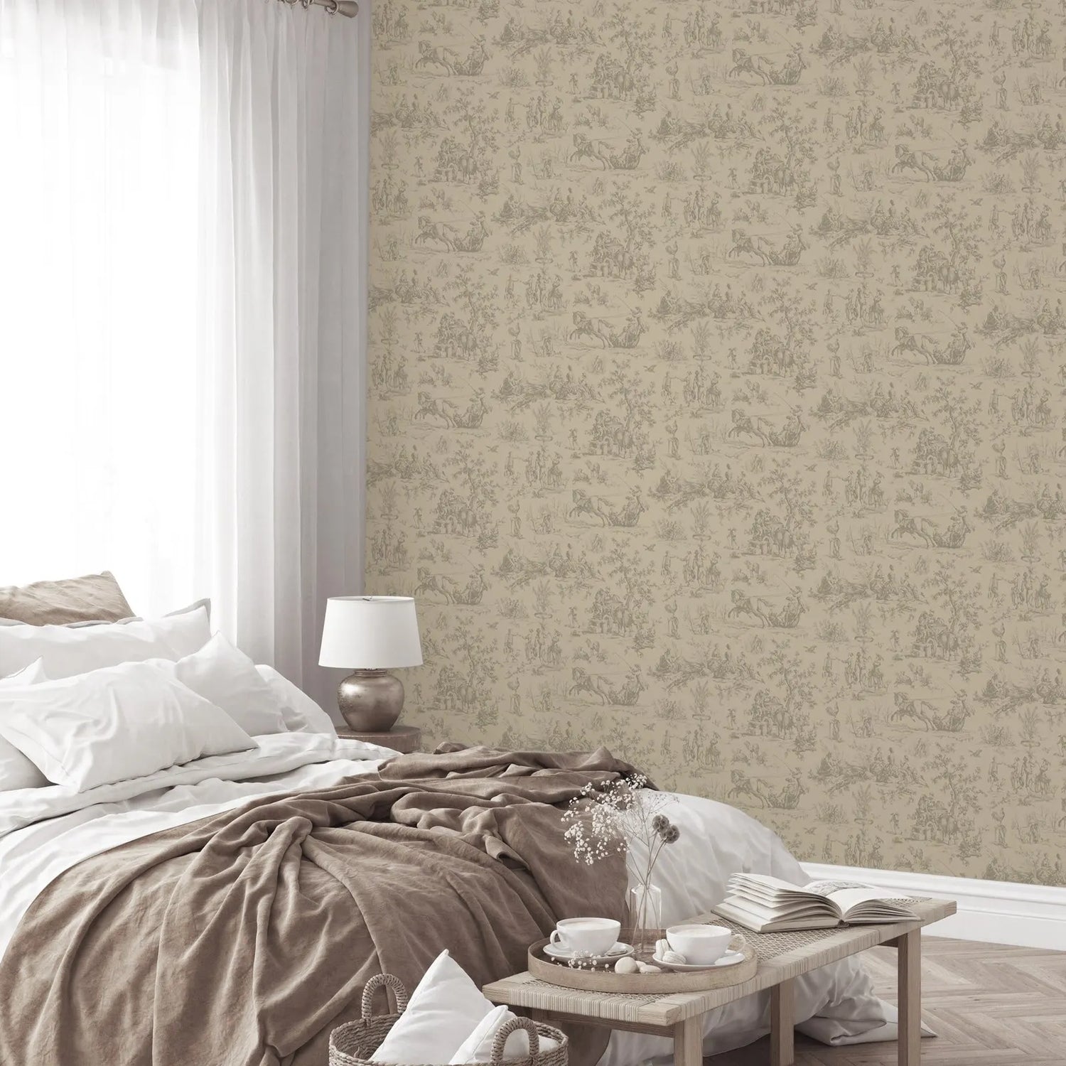 Neatly made bed with brown blanket in a room with patterned beige wallpaper.