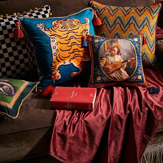 Make a bold statement with this Tibetan tiger blue checker throw pillow cover, accented with playful tassels. The vibrant blue checker pattern juxtaposed with the fierce tiger motif creates a striking visual impact, adding personality and energy to any sofa or bed. Elevate your decor with this unique and eye-catching cover that combines style, comfort, and a touch of exotic flair.