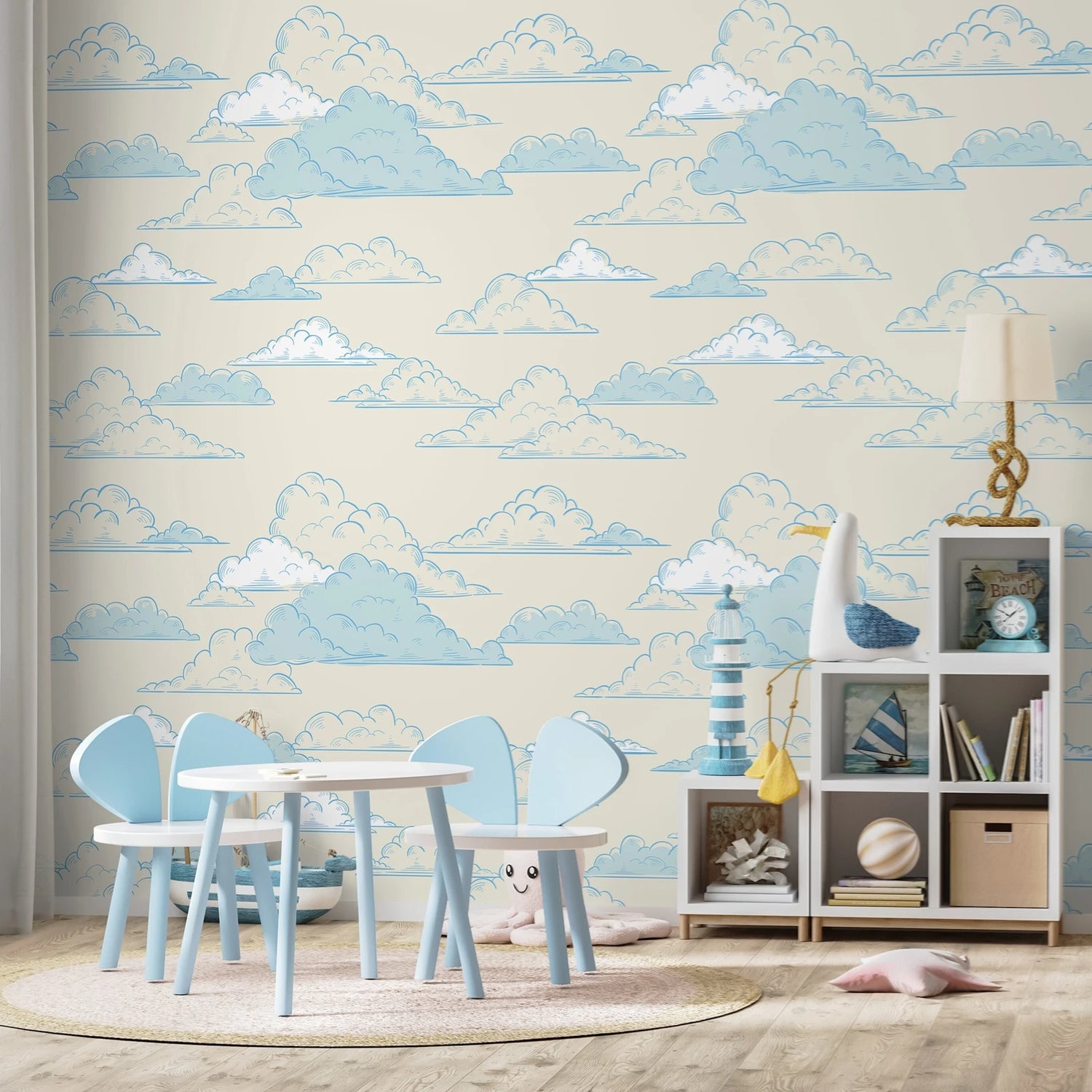 Children's room with cloud-patterned wallpaper, table, chairs, and shelves.