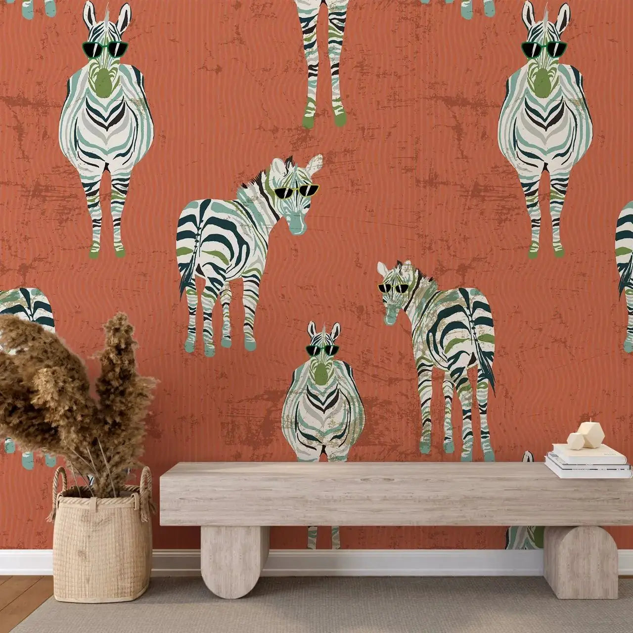 Pattern of zebras on a red wall with a wooden bench and decorative items.