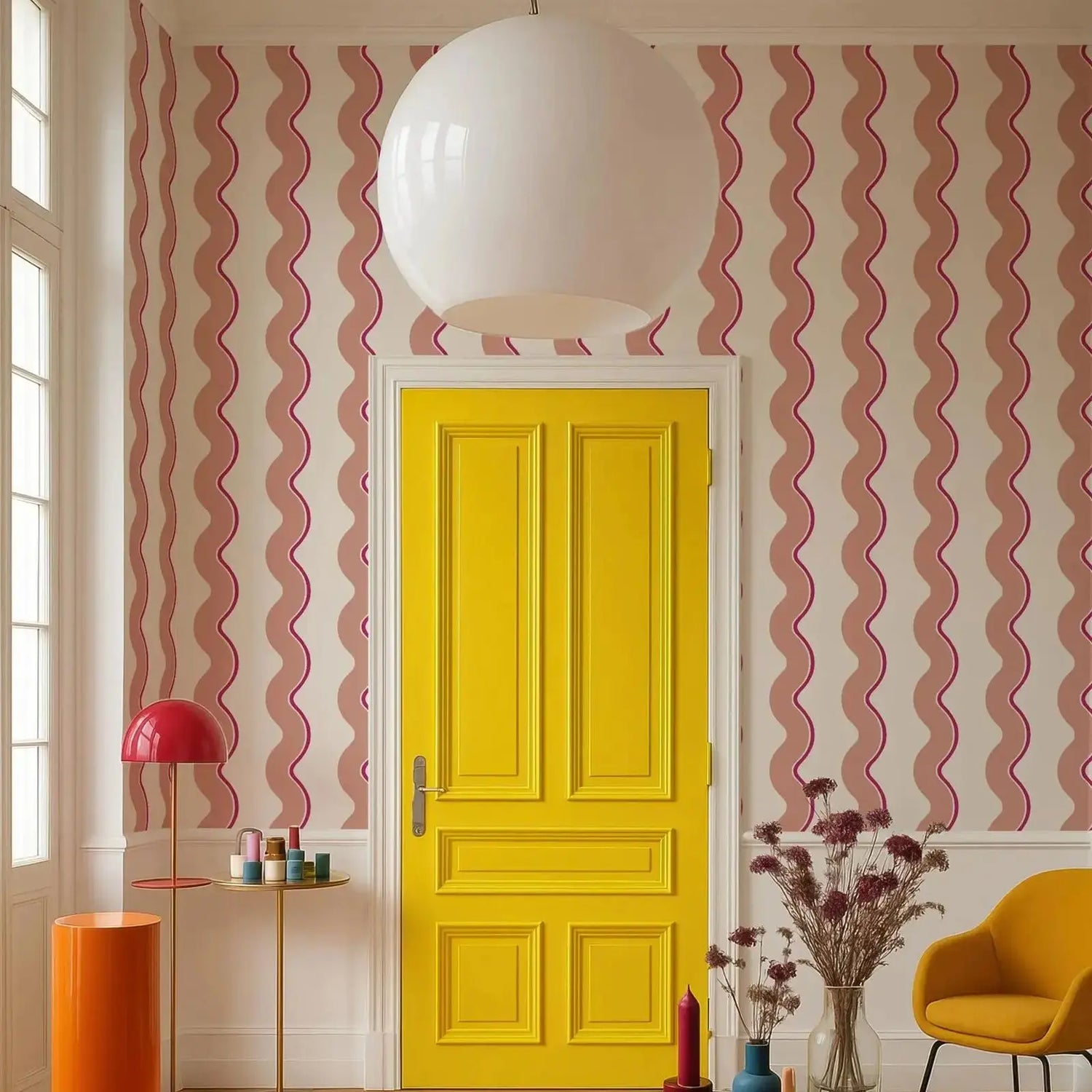 Yellow door with pink wavy-patterned walls, red lamp, and orange table in a room.