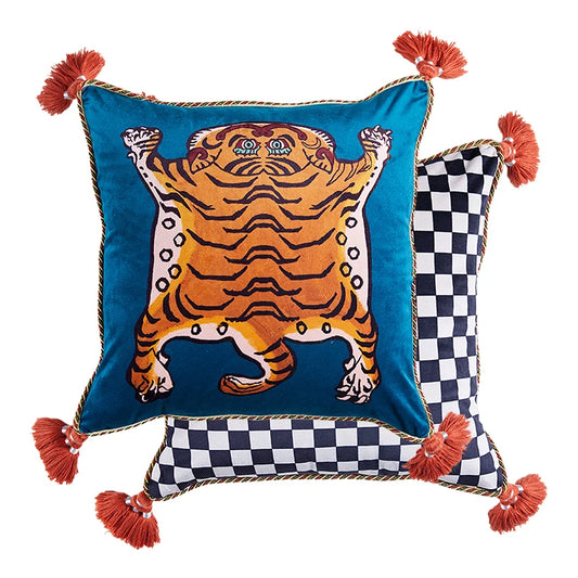 Make a bold statement with this Tibetan tiger blue checker throw pillow cover, accented with playful tassels. The vibrant blue checker pattern juxtaposed with the fierce tiger motif creates a striking visual impact, adding personality and energy to any sofa or bed. Elevate your decor with this unique and eye-catching cover that combines style, comfort, and a touch of exotic flair.