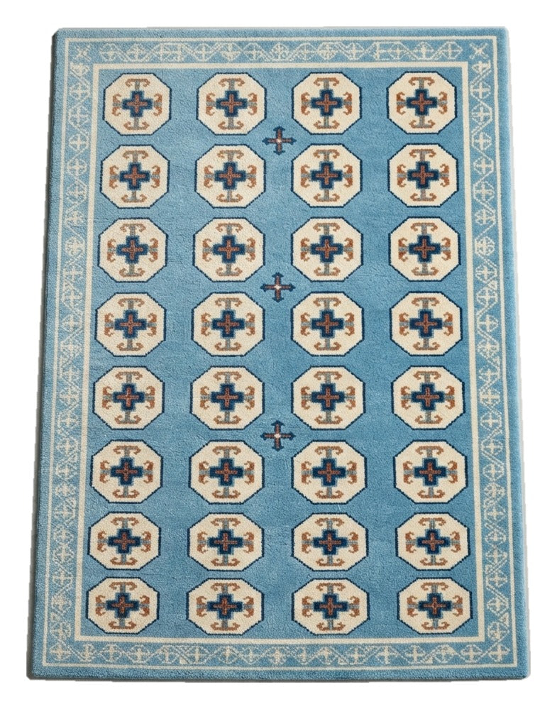 Sky Tile Parade Hand Tufted Wool Rug — light blue, cream, navy geometric rug by Maia Homes on a white background