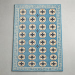 Sky Tile Parade Hand Tufted Wool Rug — light blue, cream, navy geometric rug by Maia Homes