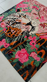 Decorative mat with a leopard and floral design on a pink background