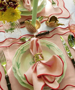 Sweetheart Scallop Placemats. These beautifully crafted placemats feature a delicate scallop edge design, adding a touch of elegance to any table setting.
