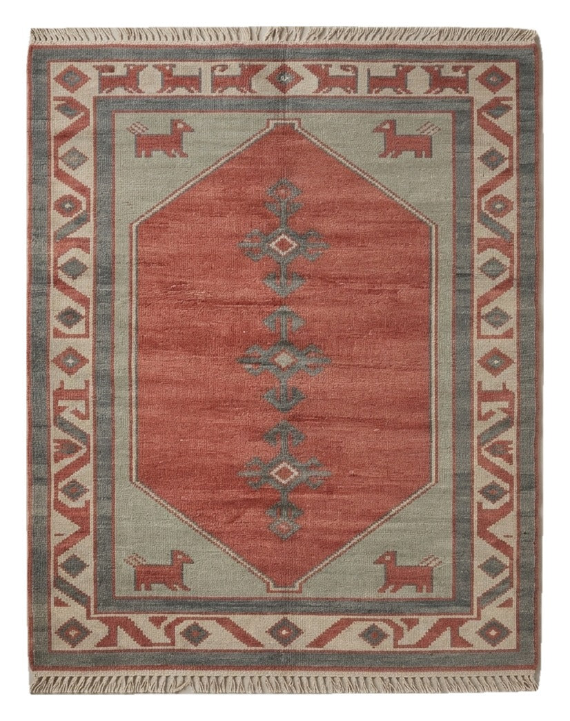 Terracotta Caravan Hand Knotted Rug — red, sage, gray tribal rug by Maia Homes on a white background