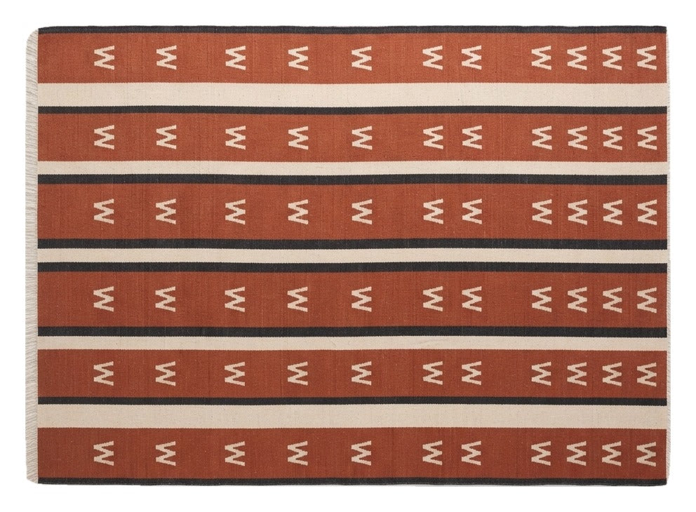 Terracotta Chevron Stripe Flatweave Rug shown flat on a white background