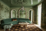Luxurious living room with green walls, art deco rug, sofa, and decorative elements.