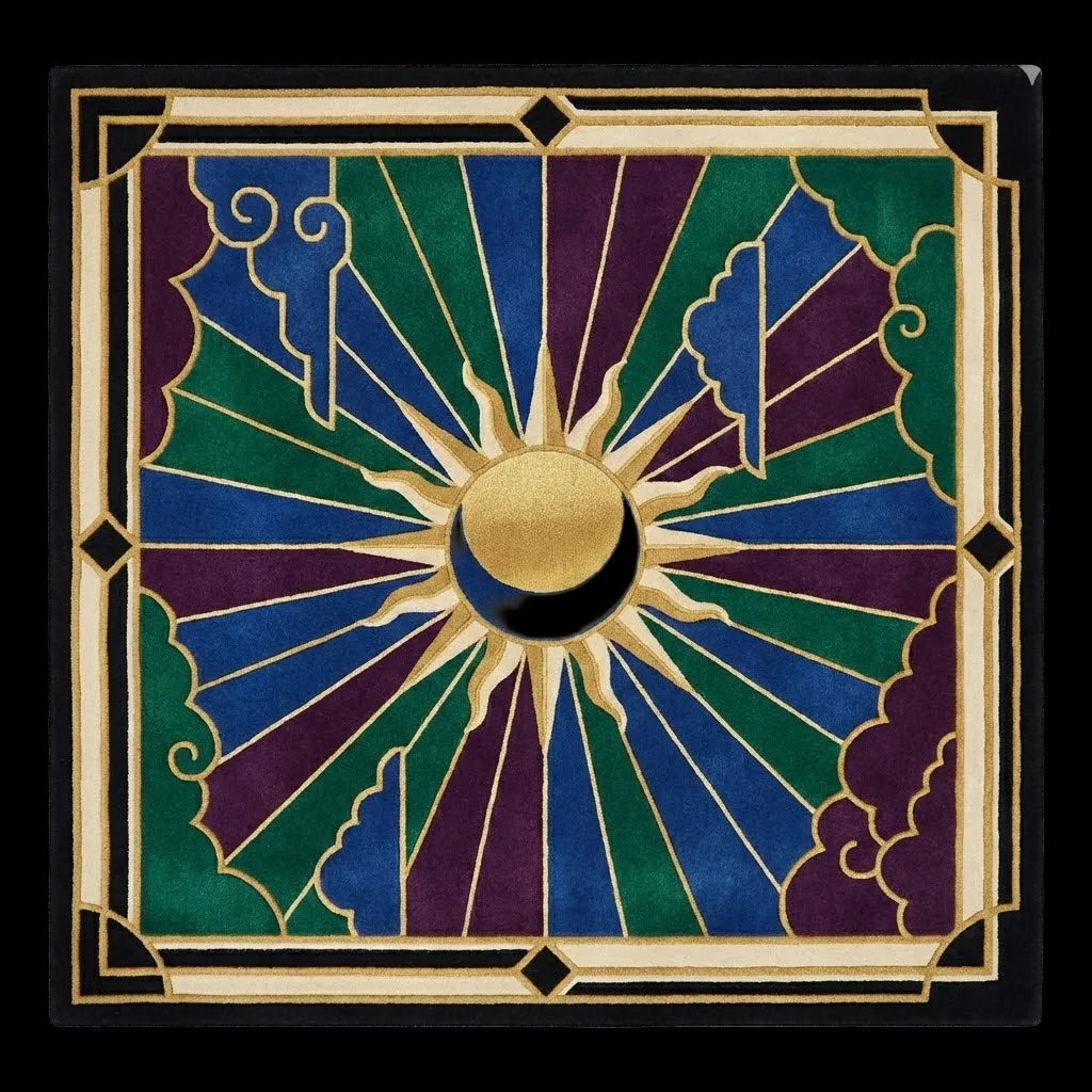 Decorative rug with sun and moon design on a white background