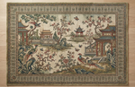 Decorative rug with intricate patterns and elements on a wooden floor
