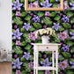 Tropical Monstera Leaves Purple Flowers Wallpaper 