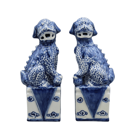 Enhance your space with this striking pair of porcelain sculptures featuring Guardian Blue Foo Dogs. Symbolizing protection and prosperity in Eastern culture, these sculptures add an air of elegance and tradition to any room.